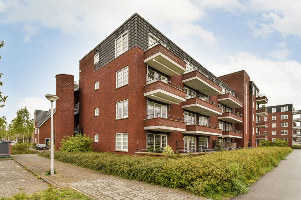 Sunset clause off the plan – brick apartment building